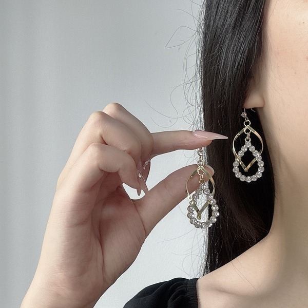 Gold Plated Cubic Zirconia CZ Twisted Dangle Drop Earrings - Image 2